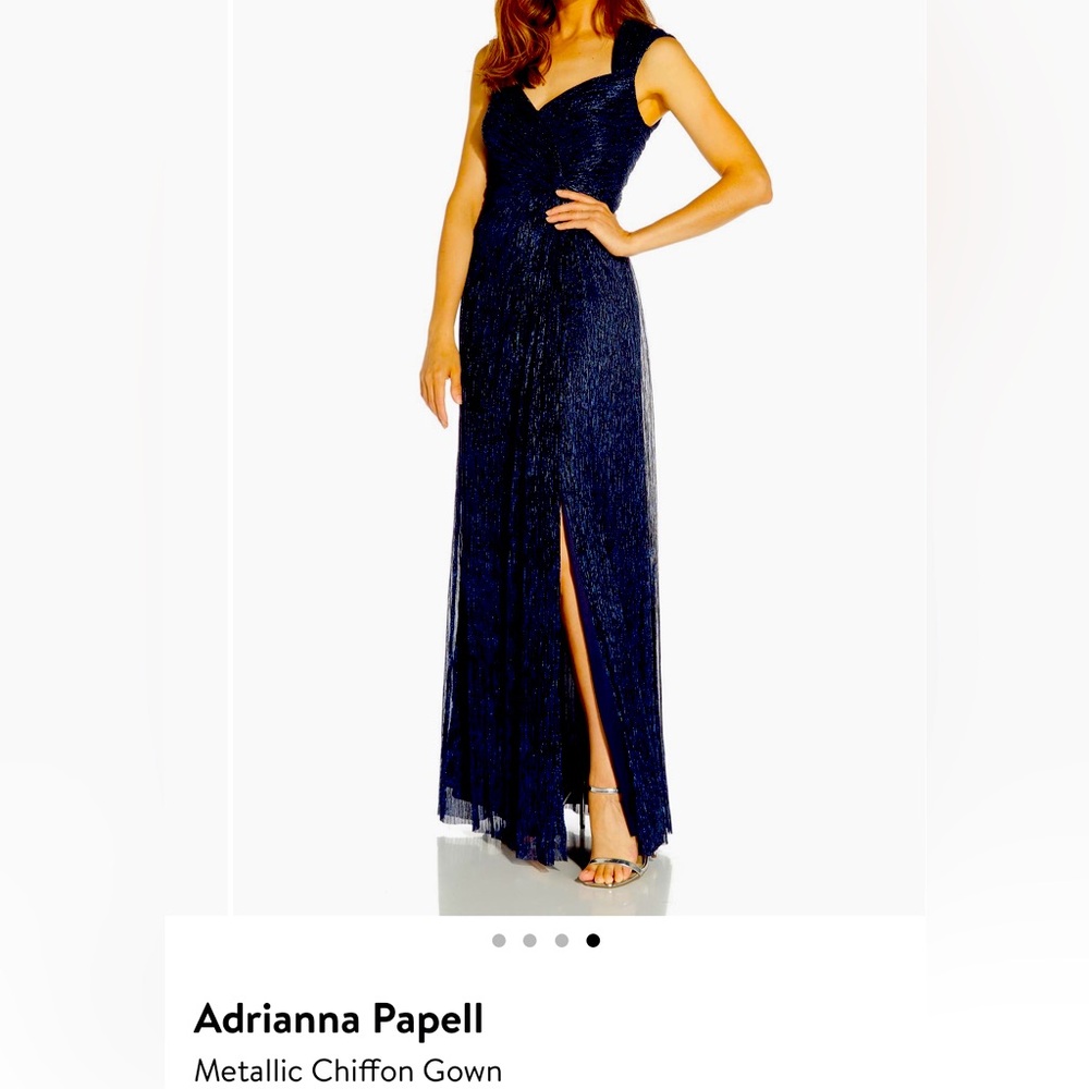 Women’s size 14 gown. Only worn once. Flows beautifully, good for any body type